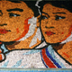 Illustration for article titled The Amazing, Colorful Flip Card Propaganda Mosaics of North Korea